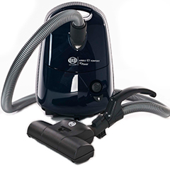 Dark blue small sebo vacuum cleaner with hose wrapped around it 