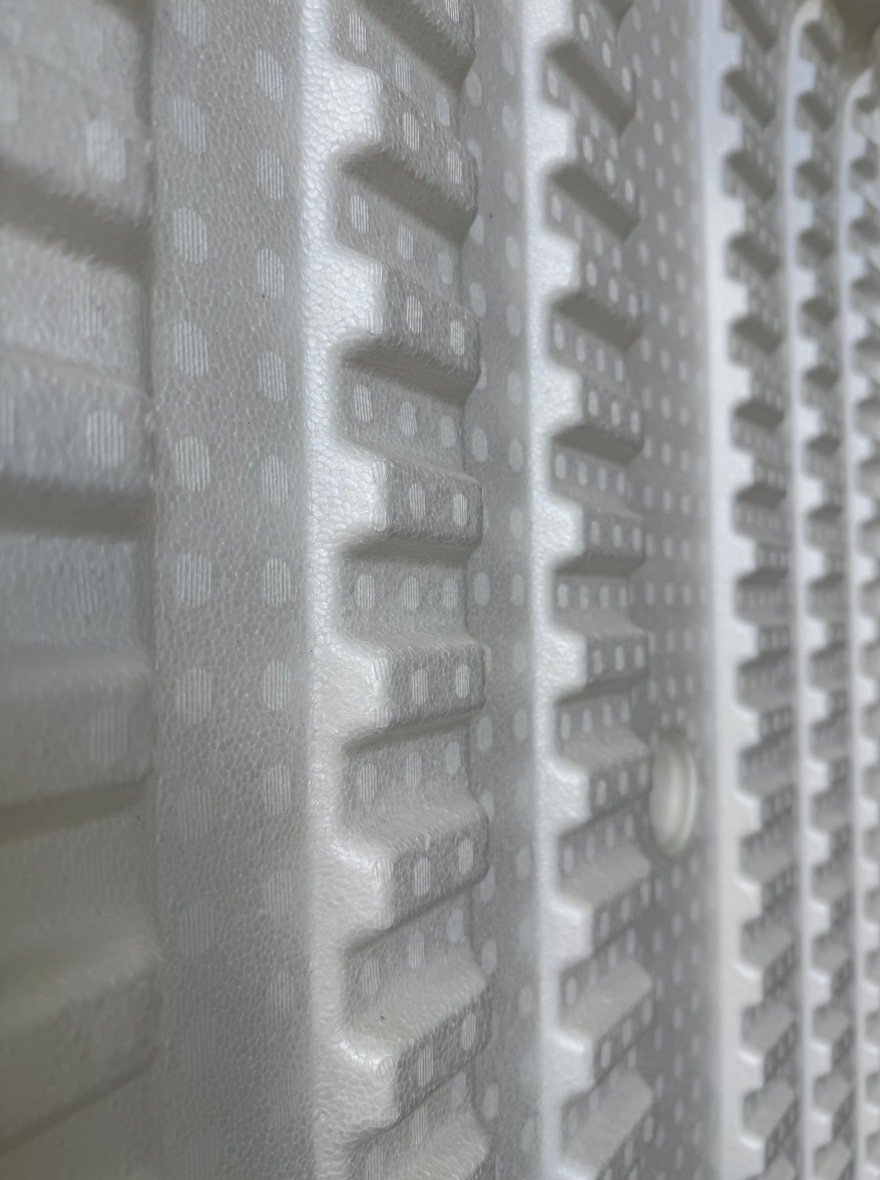 A large single-piece expanded polypropylene (EPP) transport containers