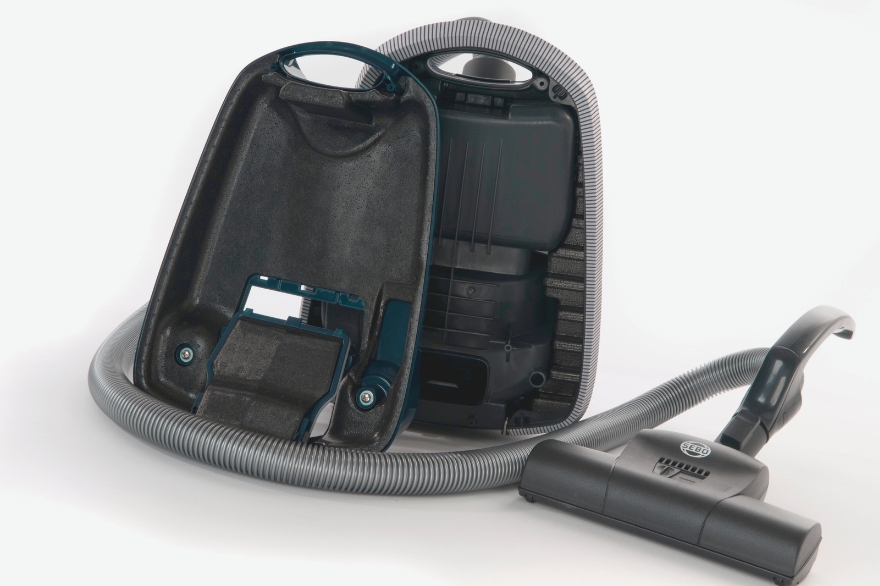 A vacum cleaner / hoover opened up to show the ARPRO inside