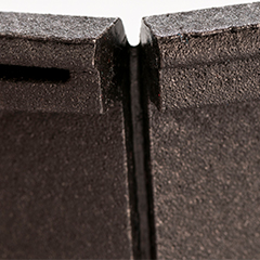 Black ARPRO (expanded polypropylene) with a very thin hinge, called a living hinge 