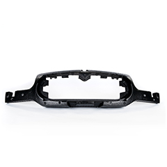 Black ARPRO (expanded polypropylene) moulded bumper with a large void in the middle with cut out grooves in both the top and bottom 