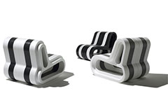 Three modern black and white striped seats that are made from ARPRO (expanded polypropylene) 